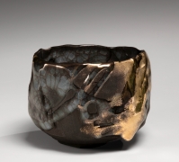 Celadon teabowl with black, crystalized iron dripping glaze and gold overglaze, 2019