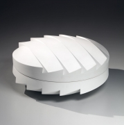 Wada Akira (b. 1978), Carved circular covered box with zig-zag faceted base and cover