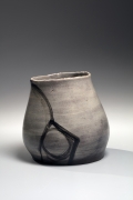 Leaning vessel with geometric patterning, ca. 1970