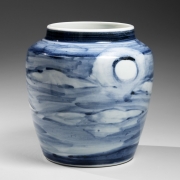 White glazed porcelain vase decorated with a harvest moon in a cloud-filled sky, ca. 1955