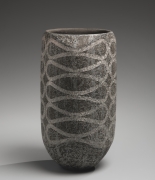 Iguchi Daisuke (b. 1975), Charcoal gray columnar vessel with curving interlaced patterning in silver slip