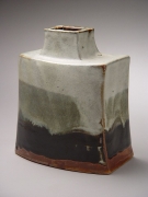 Hamada Shōji (1894-1978), Curved and flattened jar with creamy white, dark grey and black bleeding glazes